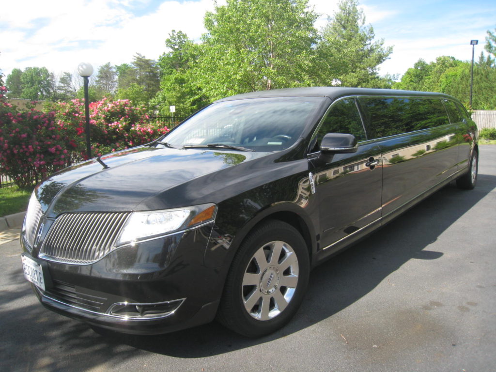 A side view of the black colored Lincoln MKT Stretch Limo Car