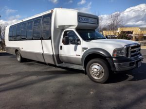 60 capacity white shuttle buss