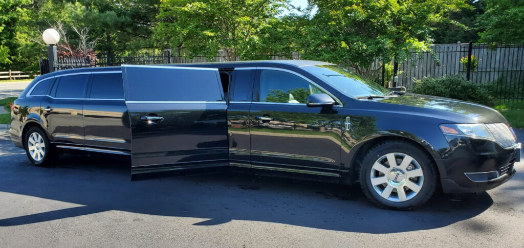 Side view of the black Lincoln MKT Royale Limousine