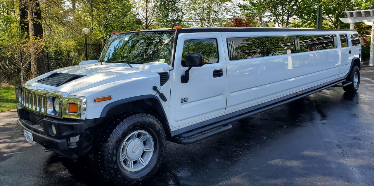 A side view of the white colored Exterior Hummer Car