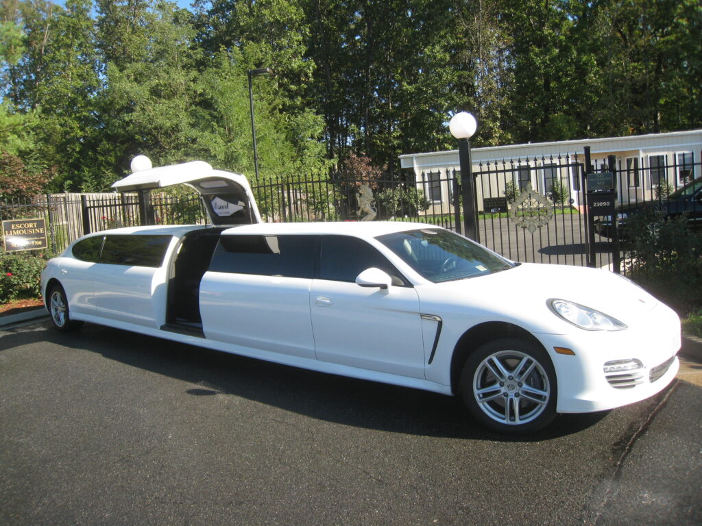 A door opened on the Porsche limousine white colored Car
