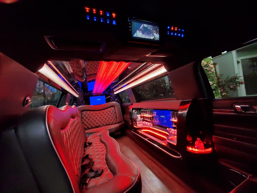 Interior of a luxury limousine with lights.